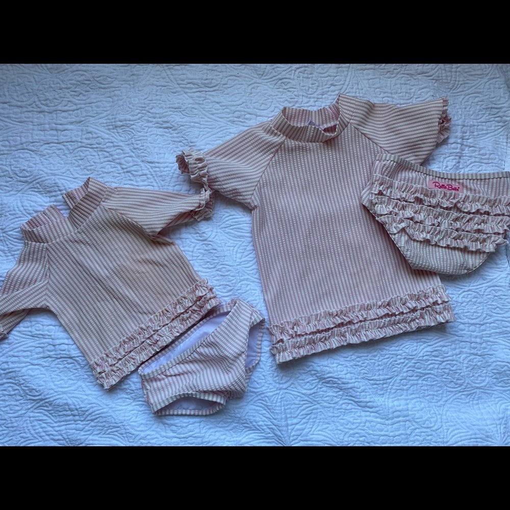 Ruffle butts pink swim suit